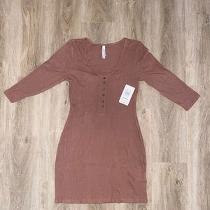 NWT. Salmon colored ribbed dress. Never worn before.
